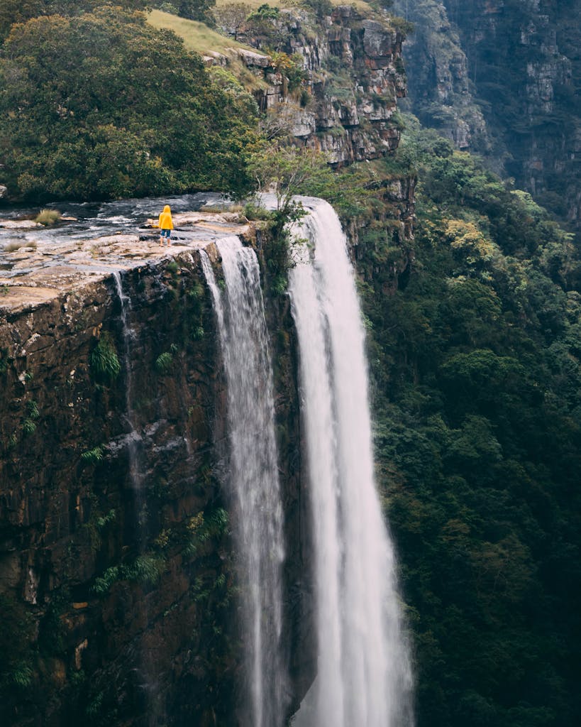 A majestic waterfall cascading down cliffs in Mpumalanga, South Africa. Tranquil natural scenery.