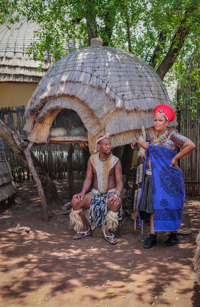 A vibrant display of South African tribal attire and cultural heritage in an outdoor setting.