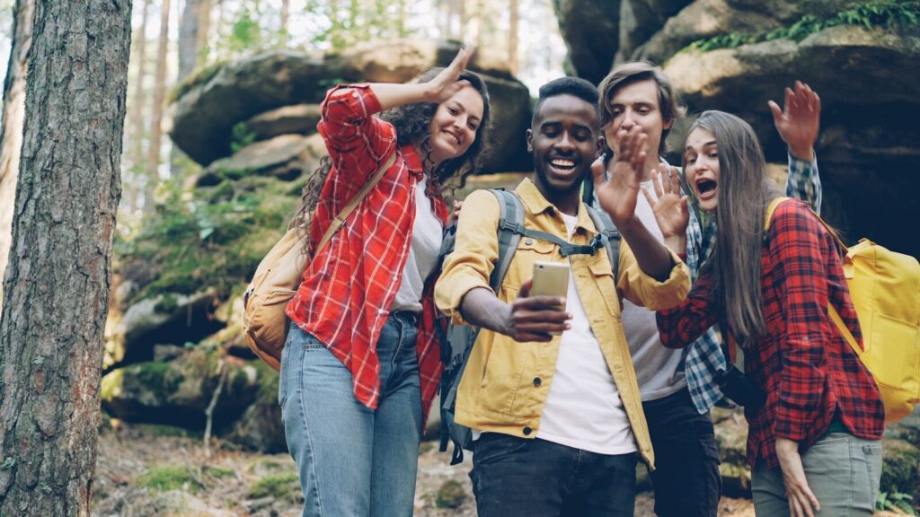 Friends taking a selfie in a forest